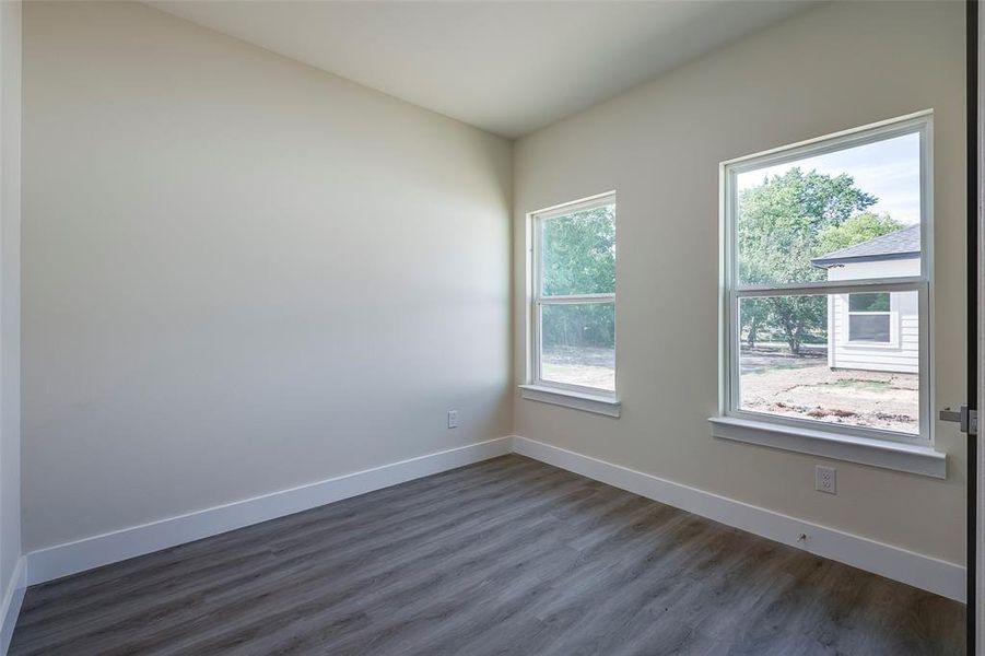 Spare room featuring hardwood / wood-style flooring