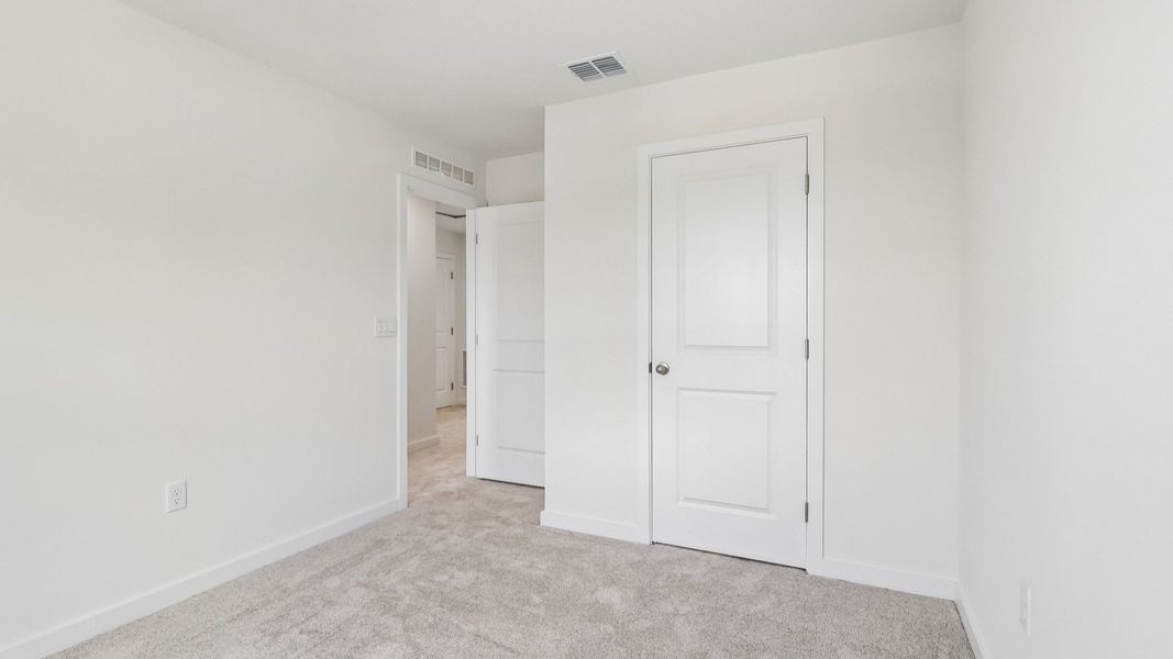 Furnished interior view inside a new home in Cyrene at Harmony, St. Cloud (Image 26).