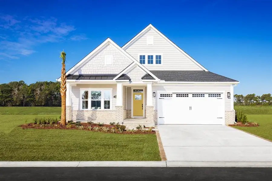 Front exterior of a new home in Grande Dunes North Village, Myrtle Beach, SC, highlighting curb appeal (Image 2).