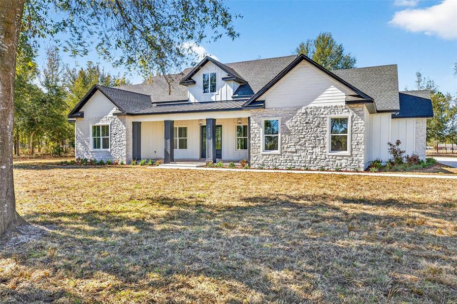 Front exterior of a new home in , Dade City, FL, highlighting curb appeal (Image 28). Front exterior of a new home in , Dade City, FL, highlighting curb appeal (Image 28).