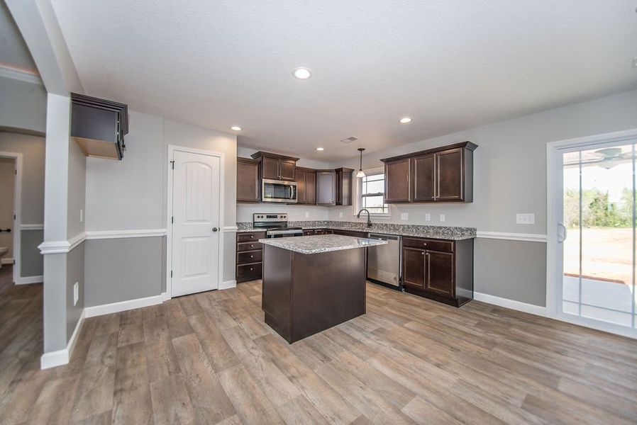 Representative furnished interior of a home built from the Archer by Enchanted Homes in Lonesome Dove, San Antonio (Image 9).