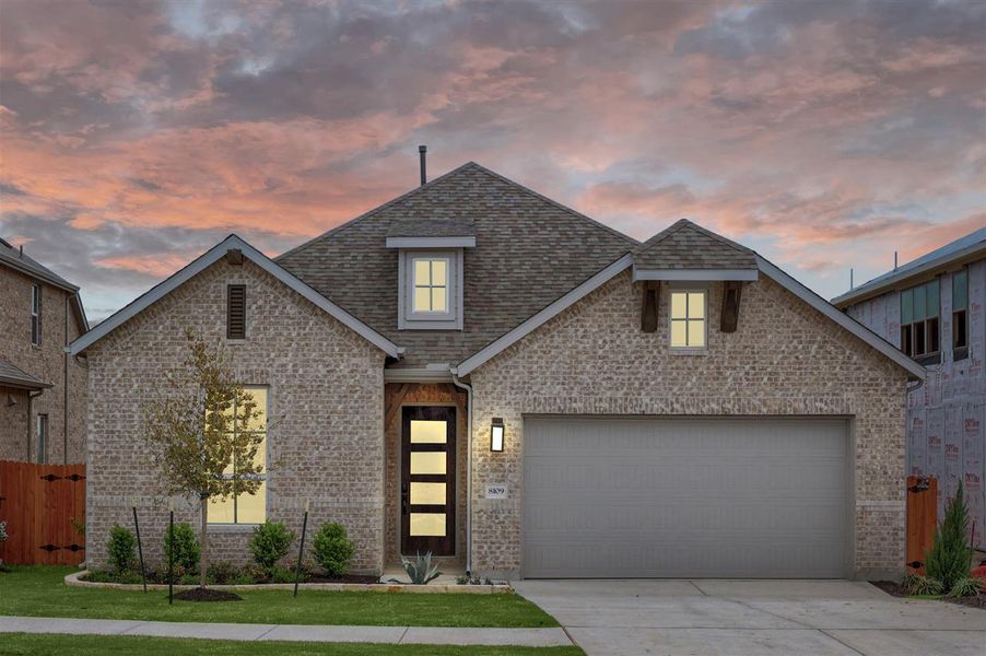 Front exterior of a new home in Lakeside at Tessera on Lake Travis, Lago Vista, TX, highlighting curb appeal (Image 17).