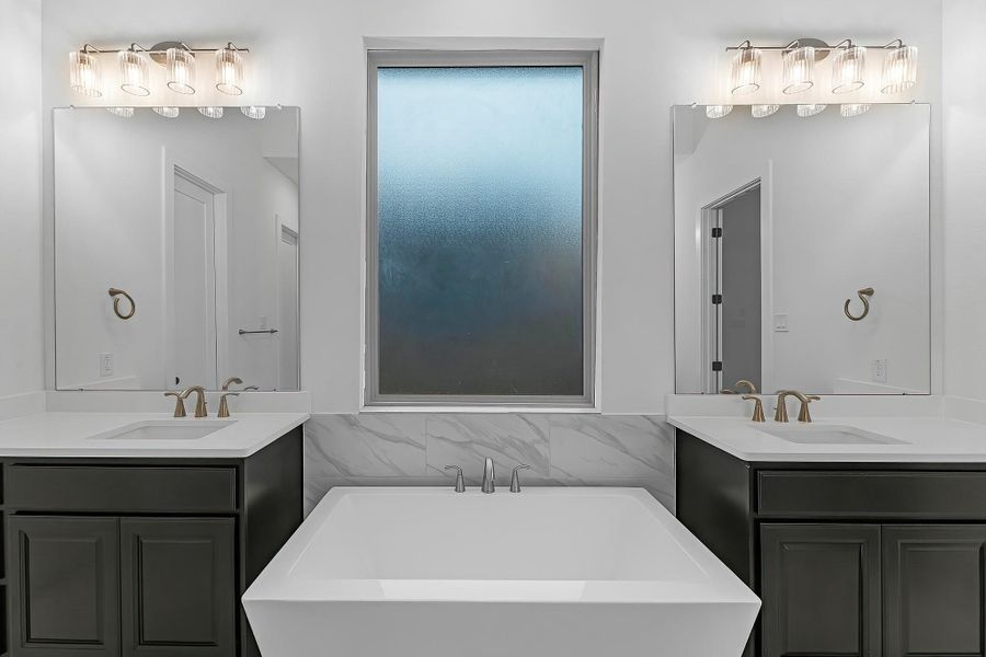 Additional view of the double sinks in the primary bathroom. Additional view of the double sinks in the primary bathroom.