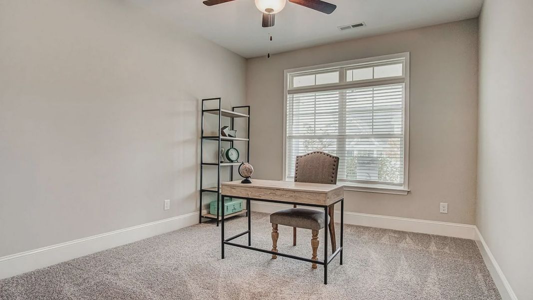 Furnished interior view inside a new home in The Cottages at 78 North, Sanford (Image 18). Furnished interior view inside a new home in The Cottages at 78 North, Sanford (Image 18).