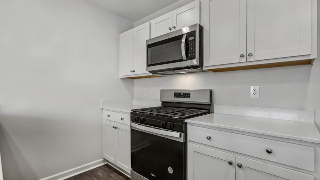 Furnished interior view inside a new home in The Townes at Honeycutt Oaks, Angier (Image 6).