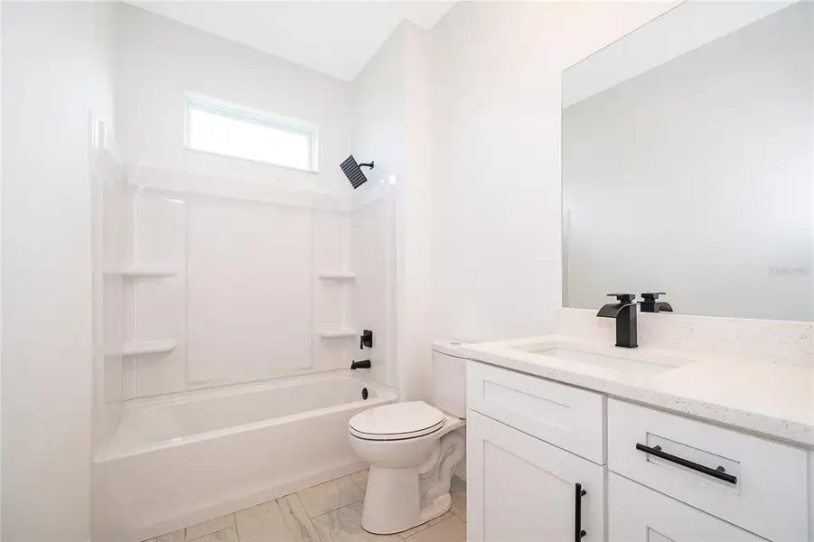 Furnished interior view inside a new home in , Kissimmee (Image 8).