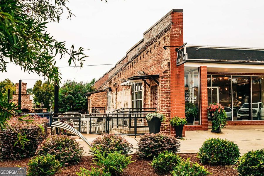 Front exterior of a new home in Rosewood Lake Estates, Hoschton, GA, highlighting curb appeal (Image 44).