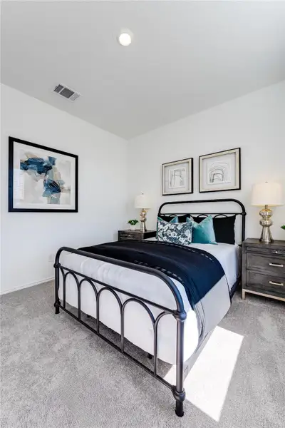 Bedroom featuring light colored carpet and recessed lighting