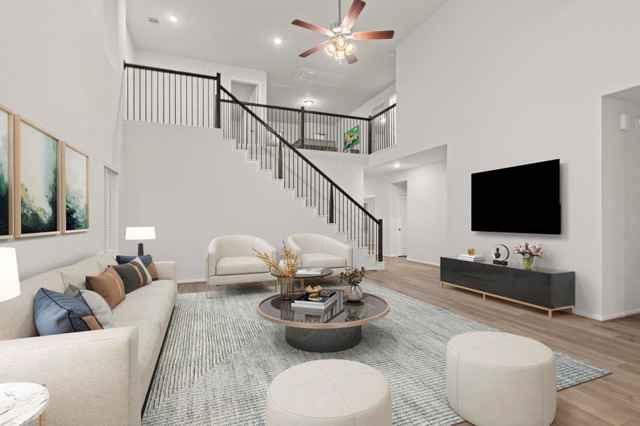 This virtually staged angle of the family area captures its elegant openness and versatility. Whether hosting guests or enjoying quiet evenings, this room offers the perfect balance of warmth and sophistication.  Let us go up those stunning stairways to discover more!