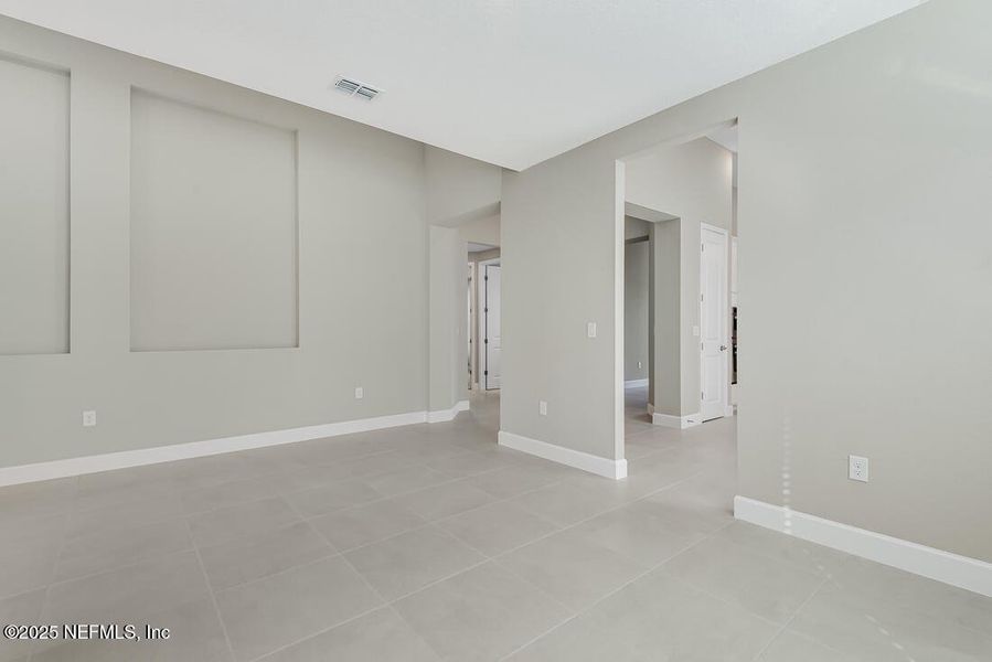 Spacious, unfurnished interior of a new home in Colbert Landings, Palm Coast (Image 42).