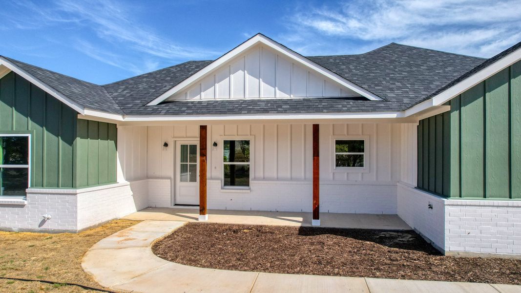 Representative exterior photo of a completed home built from the Lucas by Zeal Home Builders in Echo Grove, Poolville, TX (Image 41).