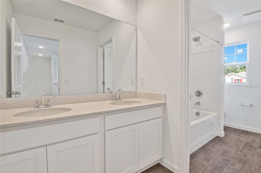 Furnished interior view inside a new home in Seasons at Shores of Lake Dell, Dundee (Image 4).