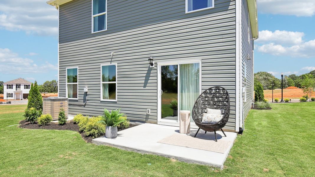 Representative exterior photo of a completed home built from the HARTSVILLE by D.R. Horton in Parkside Point, Portland, TN (Image 20).