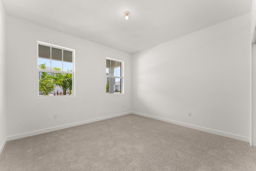 Spacious, unfurnished interior of a new home in Tradition - Cadence, Port St. Lucie (Image 6).