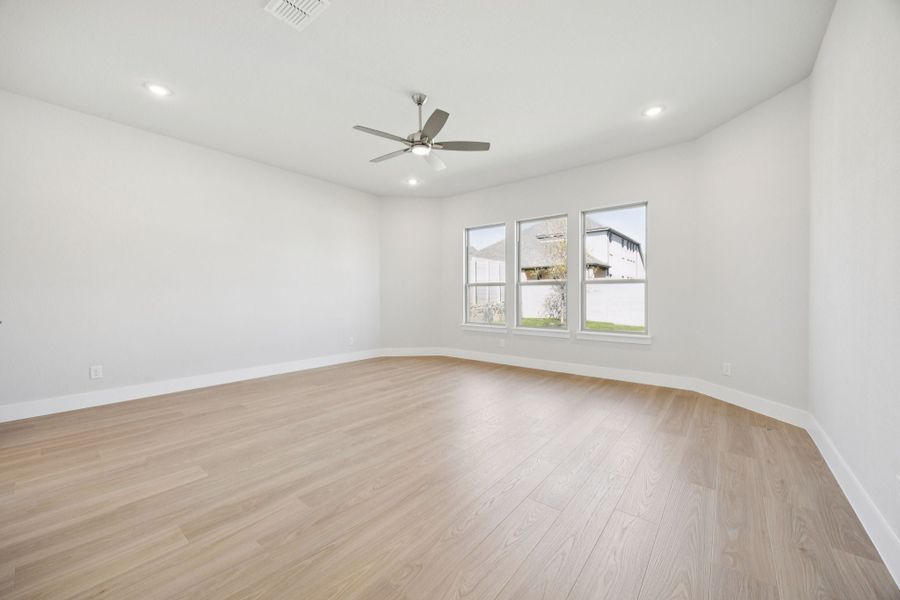 Representative unfurnished interior of a home built from the Kenai by Centre Living Homes in Painted Tree Lakeside, McKinney (Image 25).
