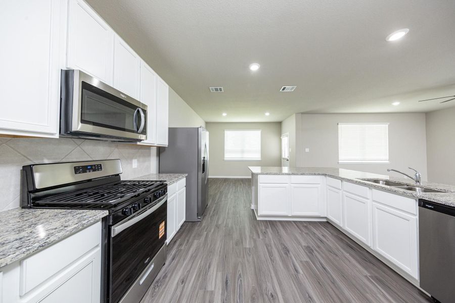 Furnished interior view inside a new home in Mackenzie Creek, Conroe (Image 5). Furnished interior view inside a new home in Mackenzie Creek, Conroe (Image 5).