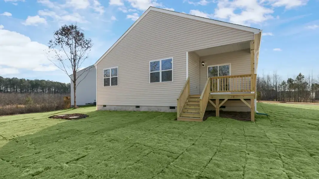 Exterior details and patio area of a home in Baker Farm, Youngsville (Image 19).