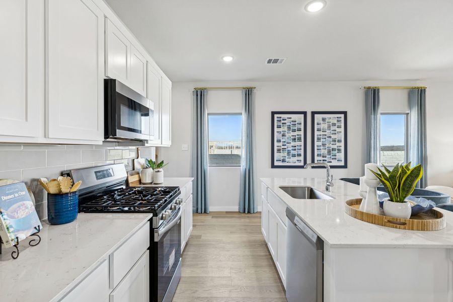 Kitchen in a Nicholson Ranch Magnolia Model Home in Lavon TX by Trophy Signature Homes