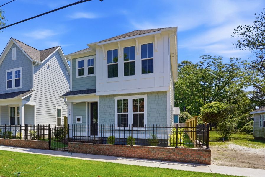 Representative exterior photo of a completed home built from the The Remington by RobuckHomes in Downtown Wilmington Collective, Wilmington, NC (Image 37). Representative exterior photo of a completed home built from the The Remington by RobuckHomes in Downtown Wilmington Collective, Wilmington, NC (Image 37).