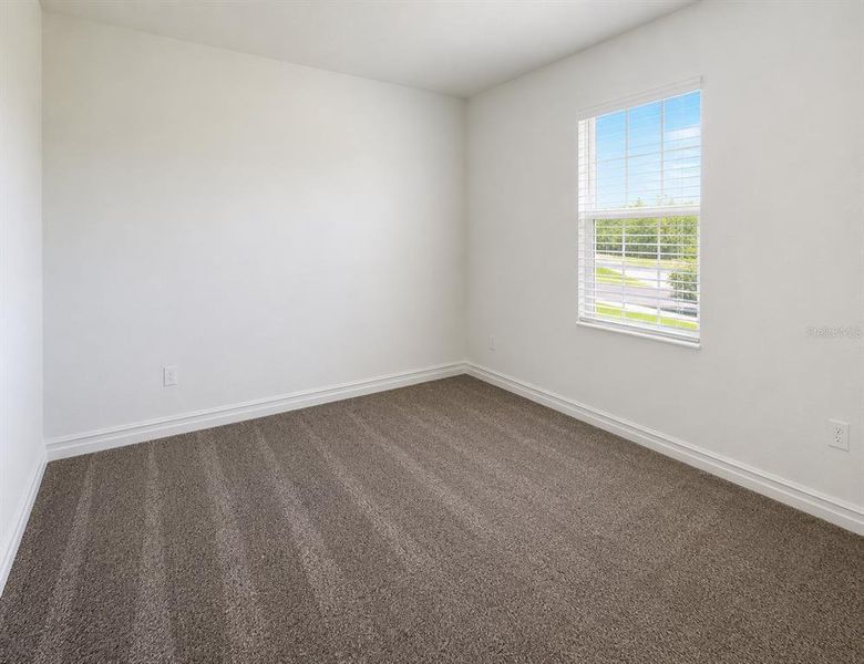 Spacious, unfurnished interior of a new home in Triple Creek: The Executives, Riverview (Image 23).