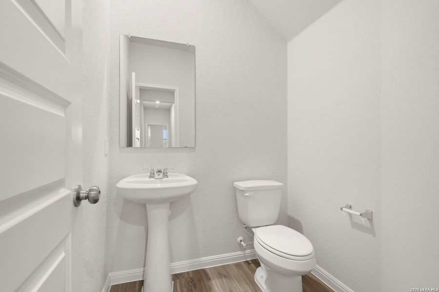 Furnished interior view inside a new home in Cinco Lakes, San Antonio (Image 7).