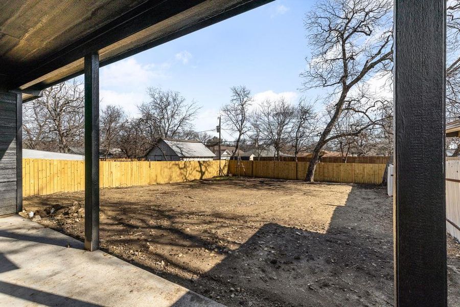 View of yard with a fenced backyard