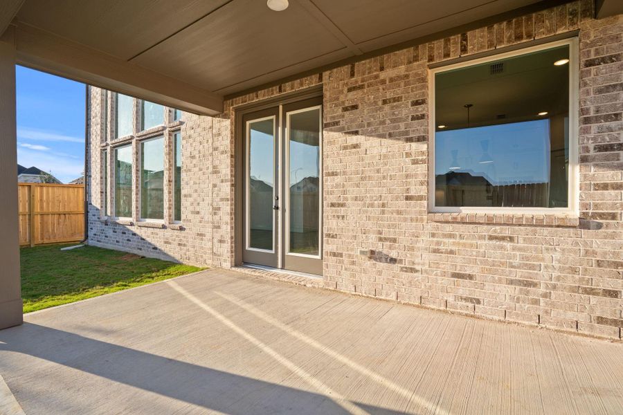 Exterior details and patio area of a home in Cross Creek West 50', Fulshear (Image 2). Exterior details and patio area of a home in Cross Creek West 50', Fulshear (Image 2).