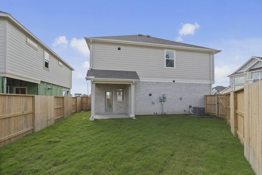 Representative exterior details of a home built from the Riverdale by Chesmar Homes in Meridiana Courtyard Collection, Manvel (Image 27).