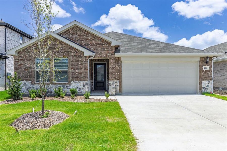 Front exterior of a new home in Stratton Place, Greenville, TX, highlighting curb appeal (Image 21). Front exterior of a new home in Stratton Place, Greenville, TX, highlighting curb appeal (Image 21).