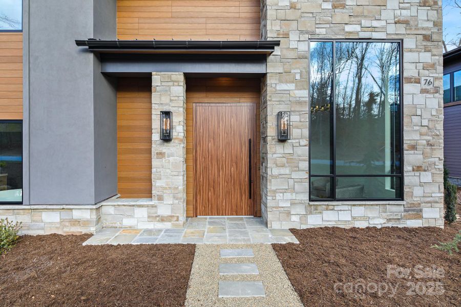 Front exterior of a new home in , Arden, NC, highlighting curb appeal (Image 19).