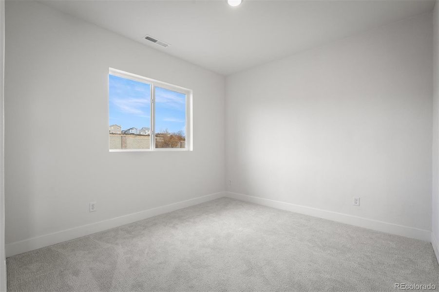 Spacious, unfurnished interior of a new home in Trailside at Cottonwood Creek, Colorado Springs (Image 26).