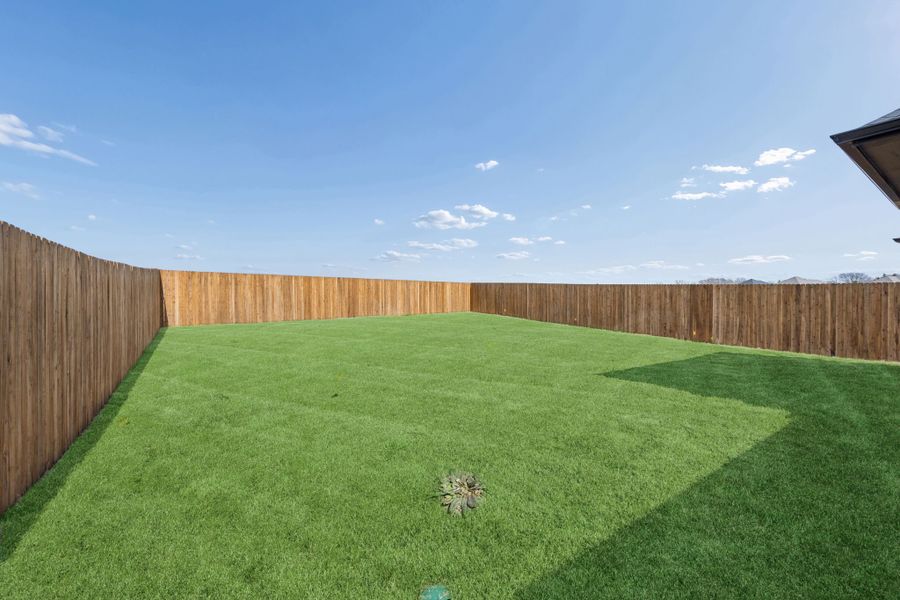 Covered Patio in the Oak II home plan by Trophy Signature Homes – REPRESENTATIVE PHOTO