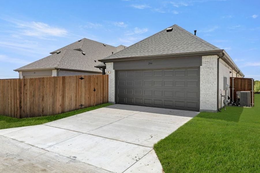 Representative exterior photo of a completed home built from the Cypress by UnionMain Homes in Edgewater, Fate, TX (Image 27).
