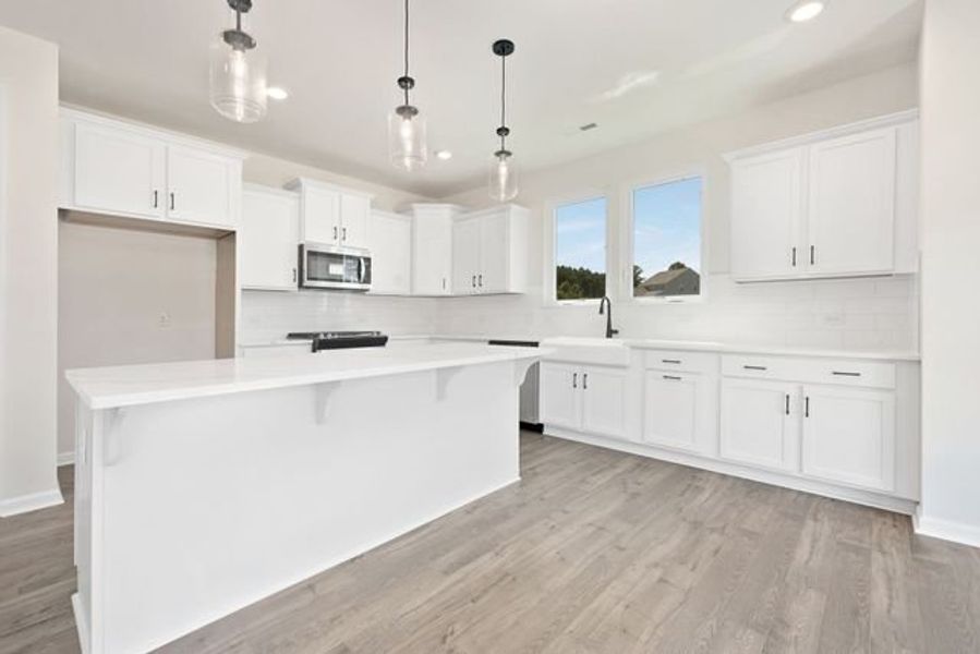Representative furnished interior of a home built from the Shaw by True Homes in Whispering Hills, Locust (Image 5).