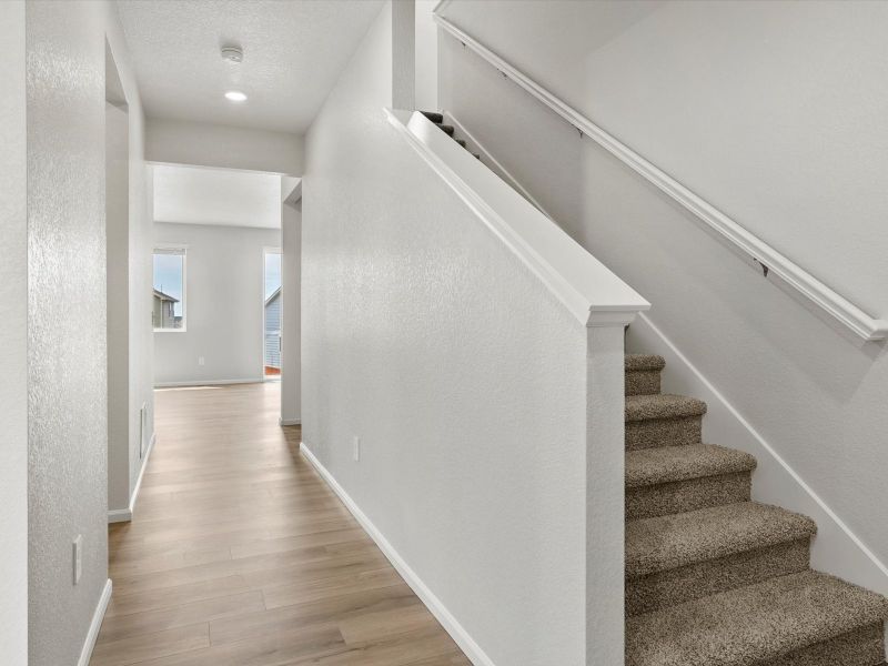 Spacious, unfurnished interior of a new home in Frontier Estates - The Flora Collection, Firestone (Image 9). Spacious, unfurnished interior of a new home in Frontier Estates - The Flora Collection, Firestone (Image 9).