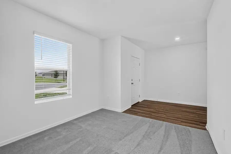 Representative unfurnished interior of a home built from the Kingfisher by Taylor Morrison in Palm Wind, Hudson (Image 21).