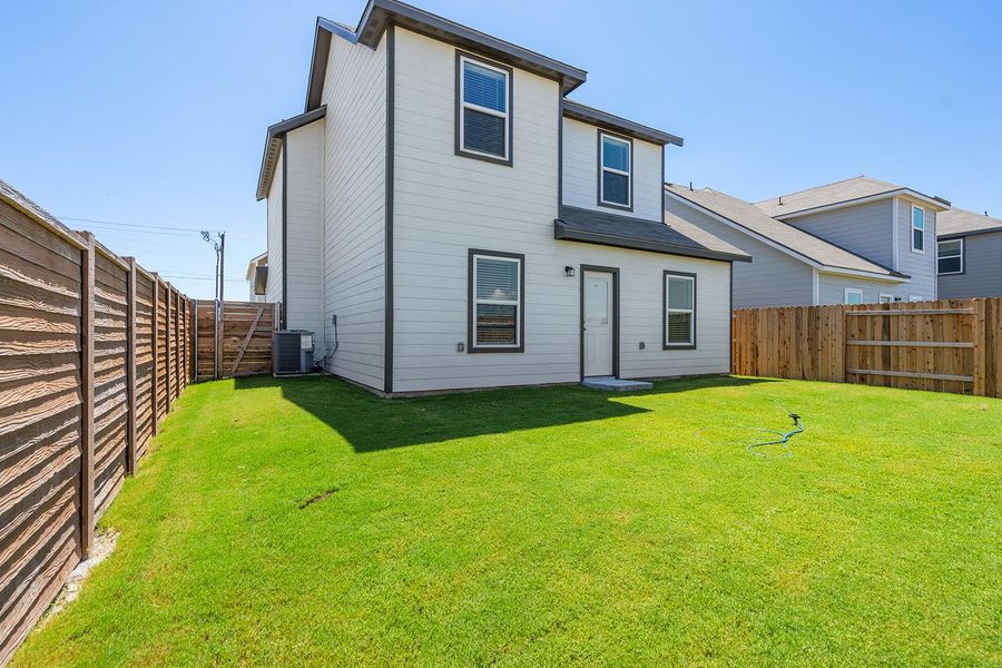 Exterior details and patio area of a home in Canyon Ranch, Jarrell (Image 2).