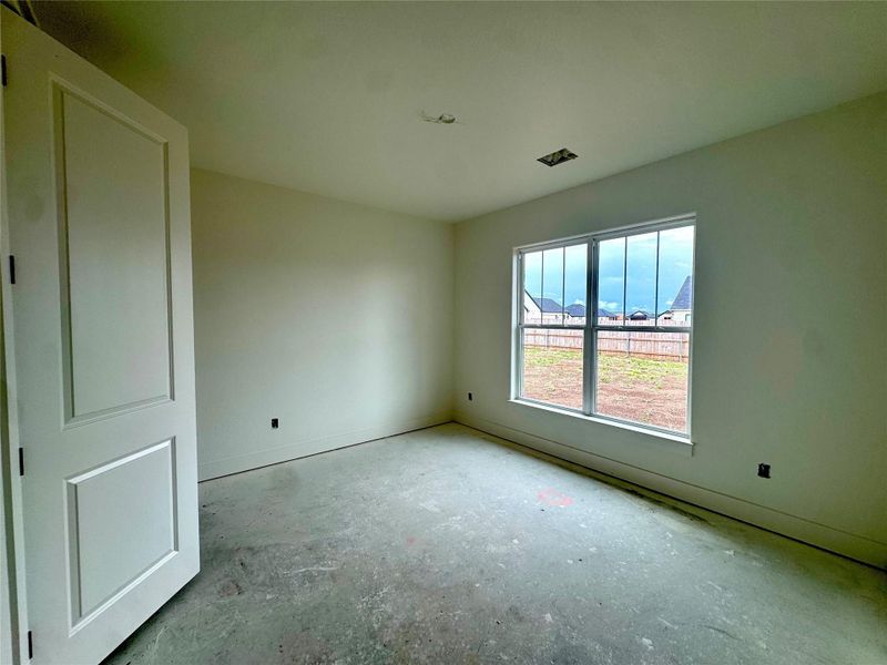 A spacious room awaits personalization, offering a canvas for your design aspirations.