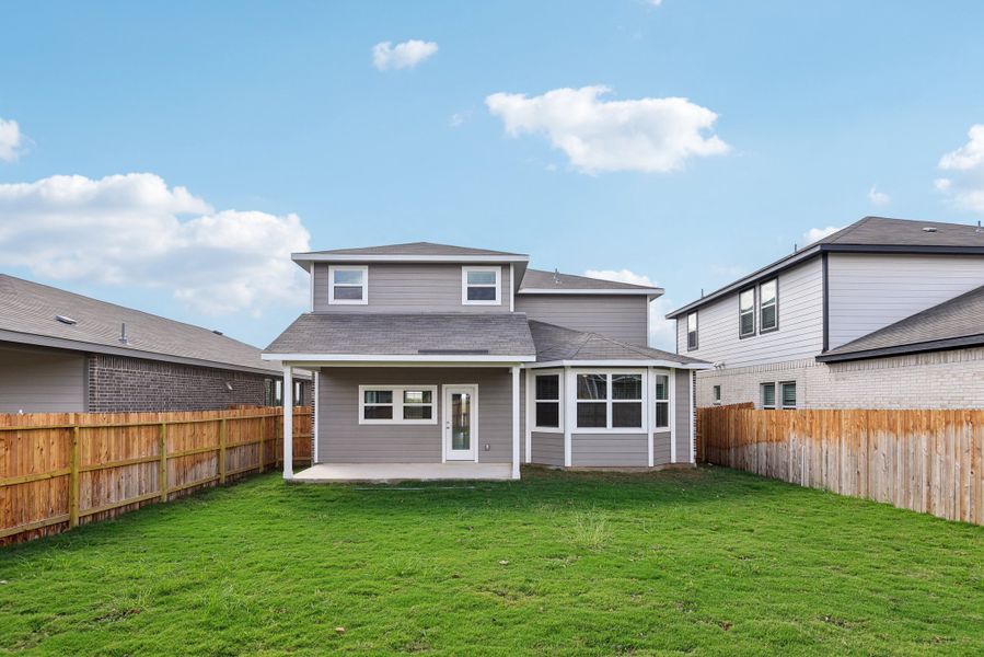 Back exterior of the Medina floorplan at a Meritage Homes community.