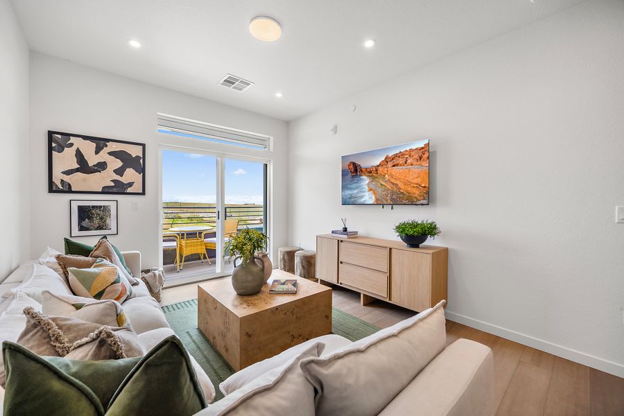 Furnished interior view inside a new home in Lyric at RidgeGate Condos, Lone Tree (Image 16).