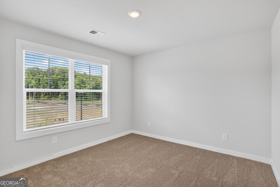 Spacious, unfurnished interior of a new home in The Fairways at Mirror Lake, Villa Rica (Image 40). Spacious, unfurnished interior of a new home in The Fairways at Mirror Lake, Villa Rica (Image 40).