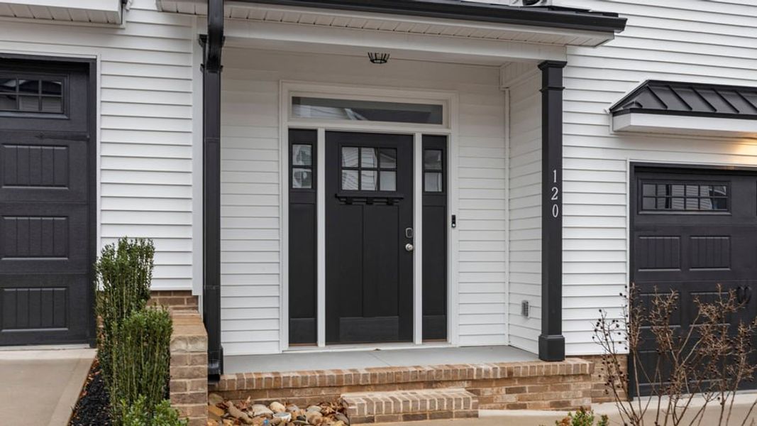 Exterior details and patio area of a home in Pearson Road Townhomes, Easley (Image 3).