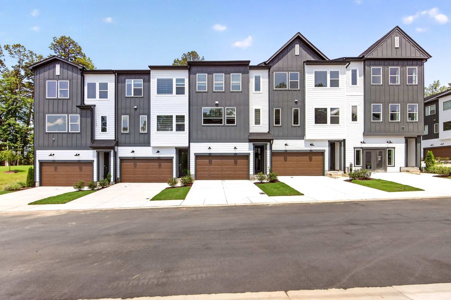 Front exterior of a new home in Archer Row, Charlotte, NC, highlighting curb appeal (Image 23). Front exterior of a new home in Archer Row, Charlotte, NC, highlighting curb appeal (Image 23).
