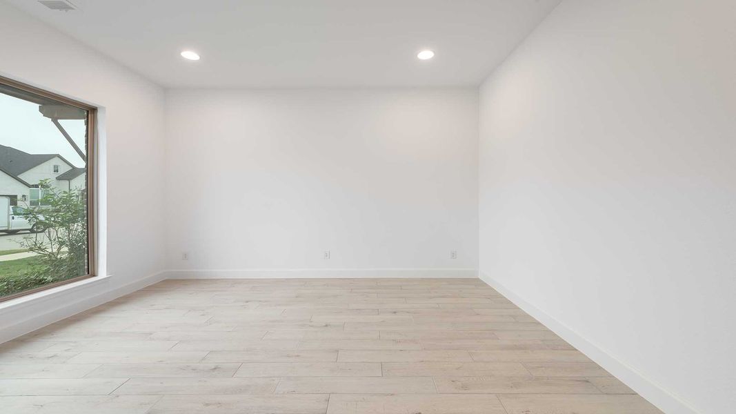 Representative unfurnished interior of a home built from the 3566W by Perry Homes in Sonoma Verde 70', Rockwall (Image 13).