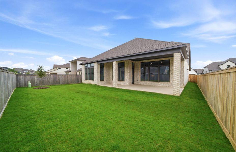 Exterior details and patio area of a home in Bridgeland 60′, Cypress (Image 22).