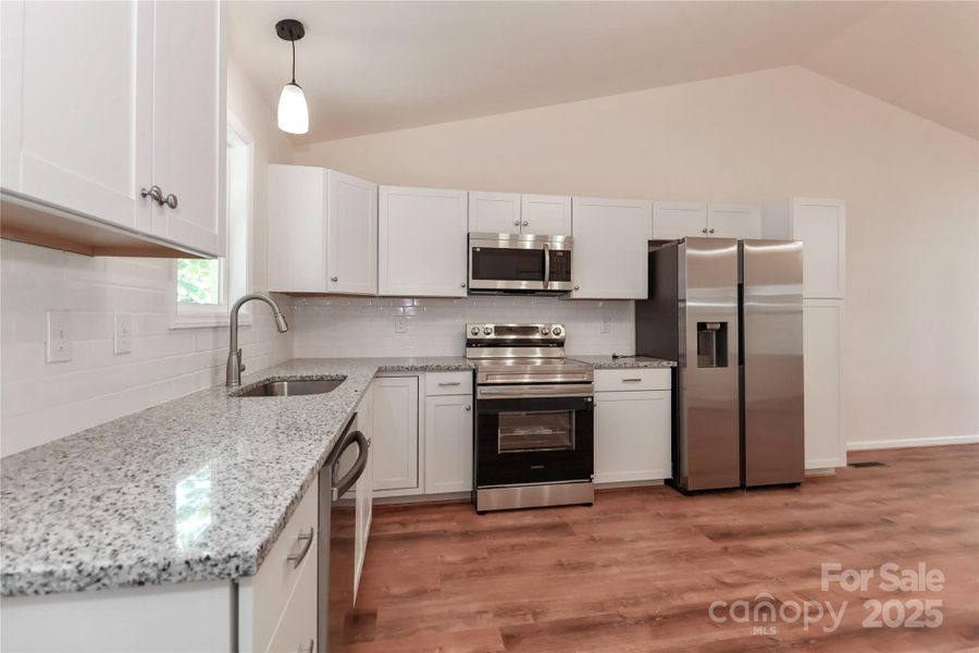 Furnished interior view inside a new home in , Statesville (Image 8).