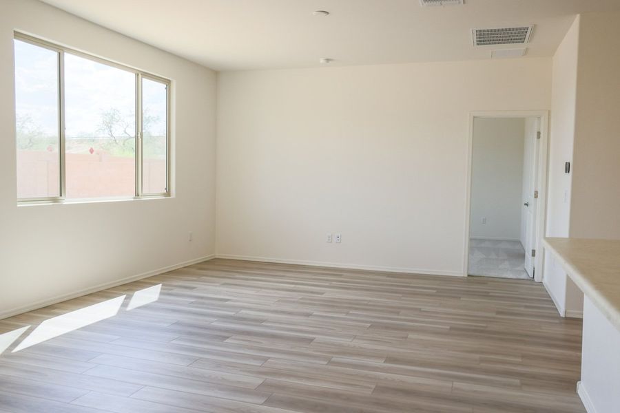 Spacious, unfurnished interior of a new home in Entrada Del Pueblo at Rancho Sahuarita, Sahuarita (Image 4). Spacious, unfurnished interior of a new home in Entrada Del Pueblo at Rancho Sahuarita, Sahuarita (Image 4).