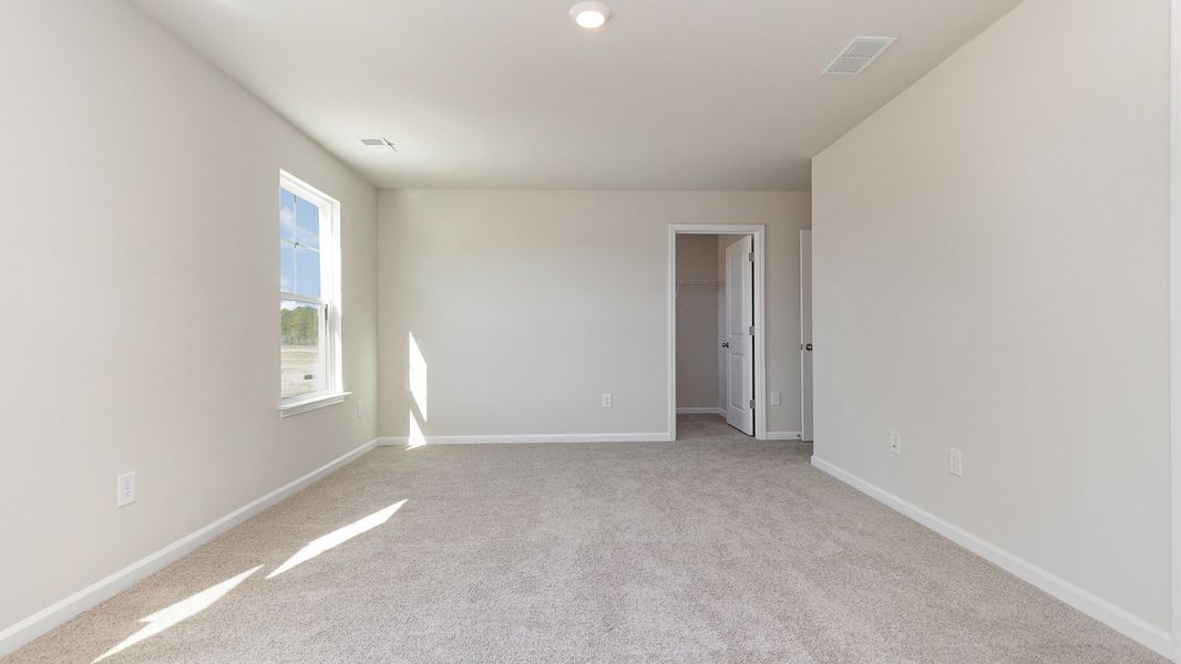 Spacious, unfurnished interior of a new home in The Forest at Black Bear, Longs (Image 8).