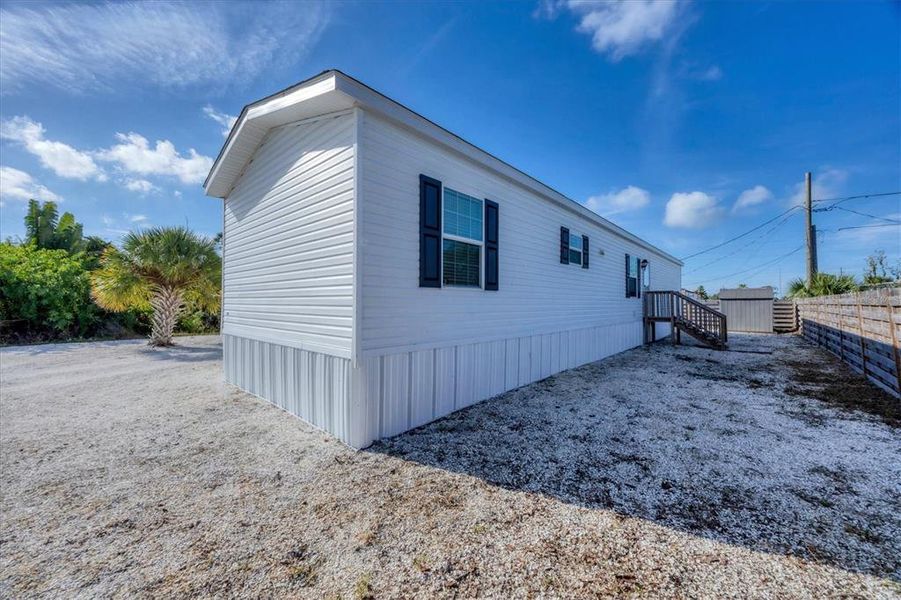 Exterior details and patio area of a home in , Englewood (Image 19).