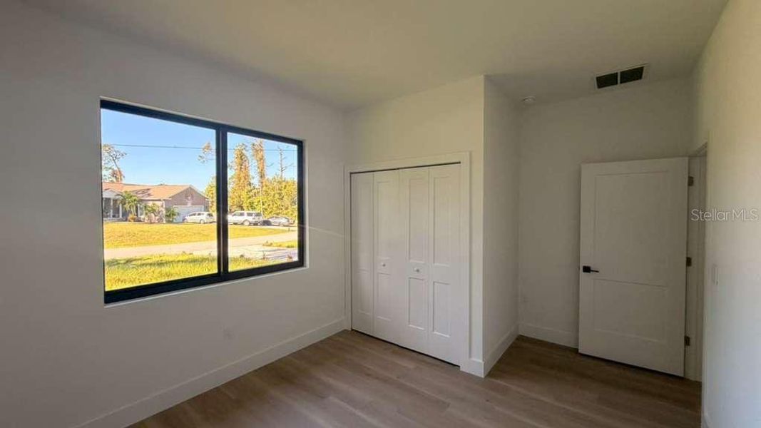 Spacious, unfurnished interior of a new home in , North Port (Image 34).